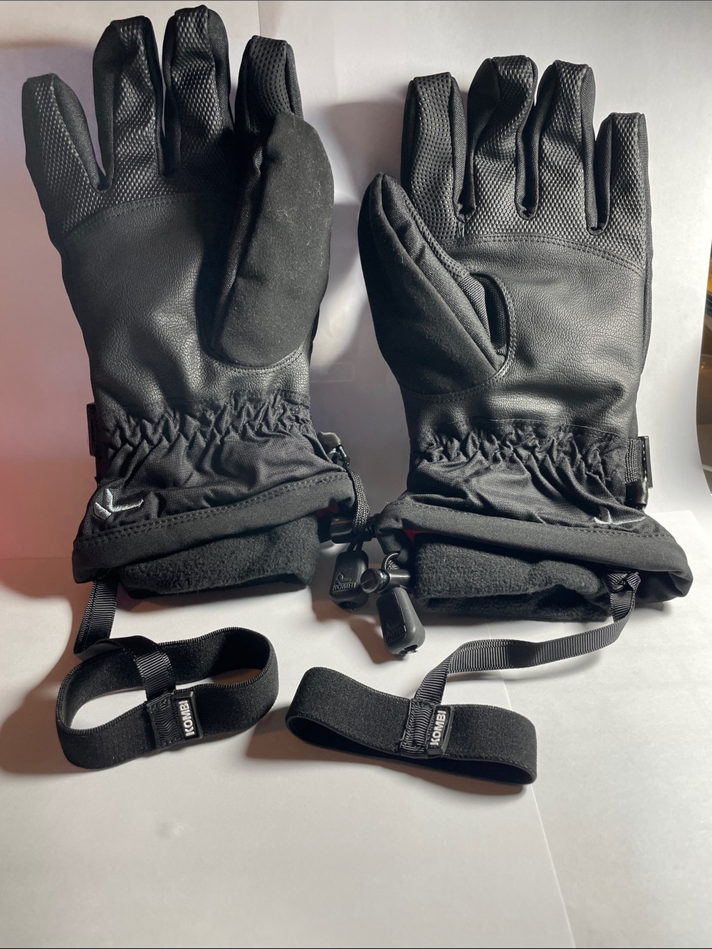 Women’s Black Kombi Cuff Gloves, size small, with wrist straps loss protection.